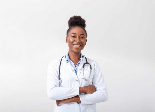doctor-with-stethoscope-hand-her-pocket-closeup-female-smiling-while-standing-straight-white-backgroundweb